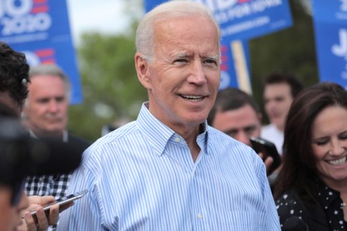 President Elect Joe Biden walking with supporters at a pre-Wing Ding march from Molly McGowan Park in Clear Lake, Iowa.