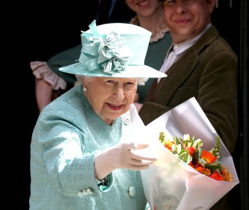 Queen Elizabeth visiting a replica of the original Sainsbury's in London in 2019
