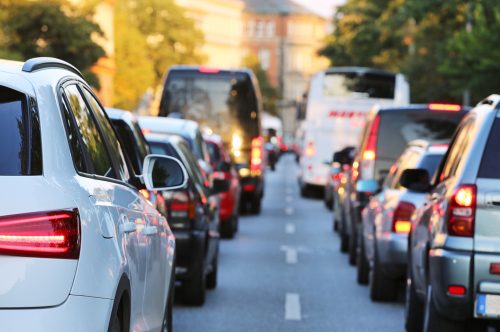 Cars sitting in a traffic jam in a city