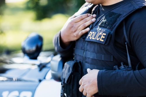 police officer speaking into radio