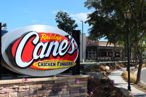 Signage of the new Raising Cane's Chicken Fingers restaurant.