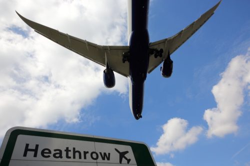 Civil passenger airplane landing at London Heathrow international airport.