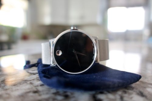 MOVADO LUXURY WATCH SITTING ON COUNTER AT HOME