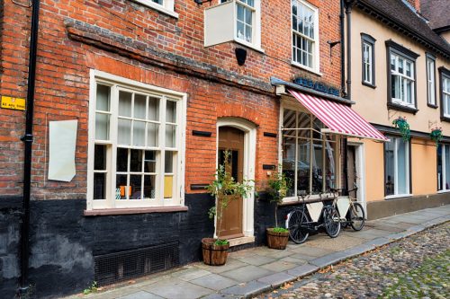 Cobbled streets and shops at Norwich in Norfolk.