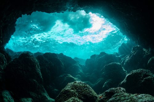 Rays of sunlight into the underwater cave