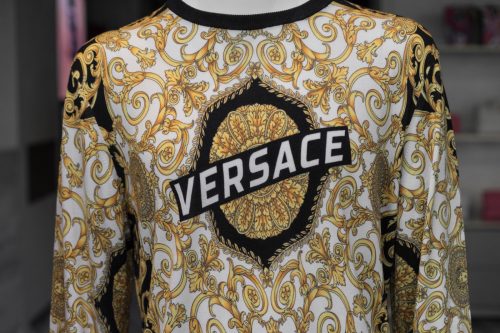 Versace company logo on t-shirt.