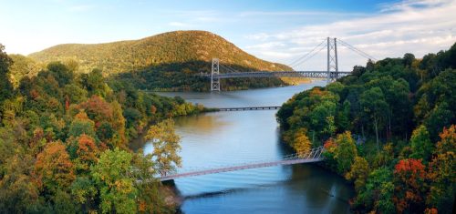 Hudson River valley panorama in Autumn with colorful mountain and Bridge over Hudson River.