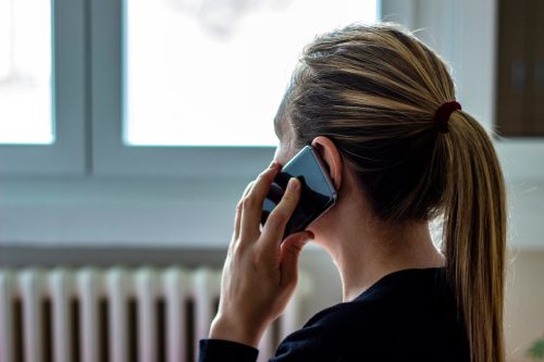 woman answering phone