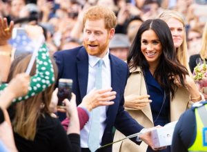 meghan and harry in a crowd, prince harry dad