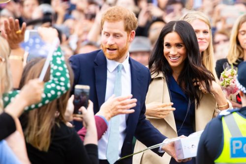 meghan and harry in a crowd, prince harry dad