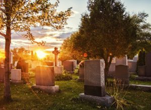 a cemetery during sunrise