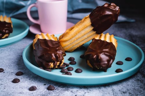 Dark chocolate coated half digestive biscuit with chocolate cookies and chips for loved ones valentines day celebration.