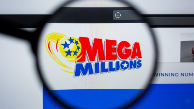 MEGA MILLIONS logo visible on display screen.