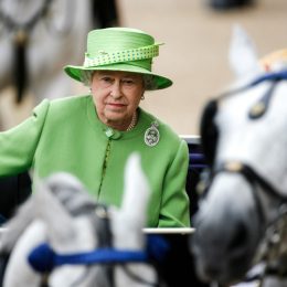 Her Royal Highness Queen Elizabeth II travels by carriage during the Trooping the Colour ceremony.