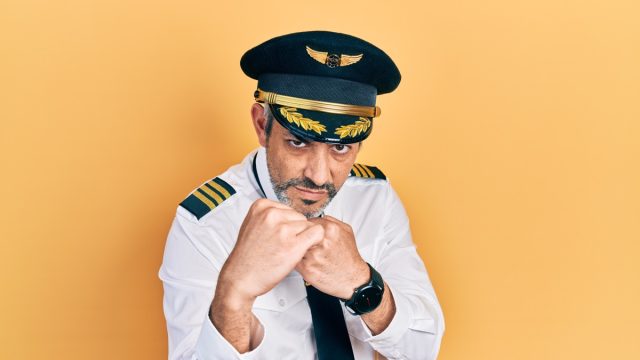 Handsome,Middle,Age,Man,With,Grey,Hair,Wearing,Airplane,Pilot