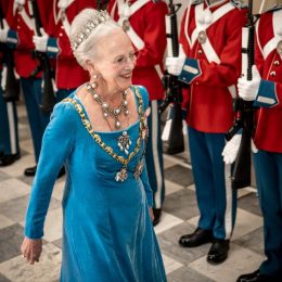 Queen Margrethe of Denmark reviews an honour guard as she arrives to the gala banquet at Christiansborg Palace