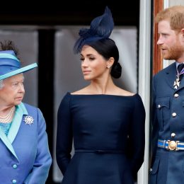 Queen Elizabeth Worried Prince Harry Was “a Little Too in Love” With Meghan, Say Reports