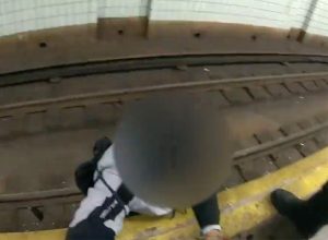 Terrifying Moment Hero NYPD Officers Pull Fallen Stranger From Subway Tracks to Safety