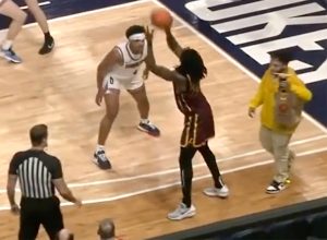 Bizarre Moment Lost Fast-Food Delivery Guy Wanders Into College Basketball Game to Give McDonald’s Order to Customer