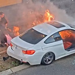 Heartstopping Moment Hero Police Officer and Good Samaritan Rescue Unconscious Driver Seconds Before Car Burst in Flames