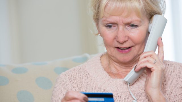 Senior,Woman,Giving,Credit,Card,Details,On,The,Phone