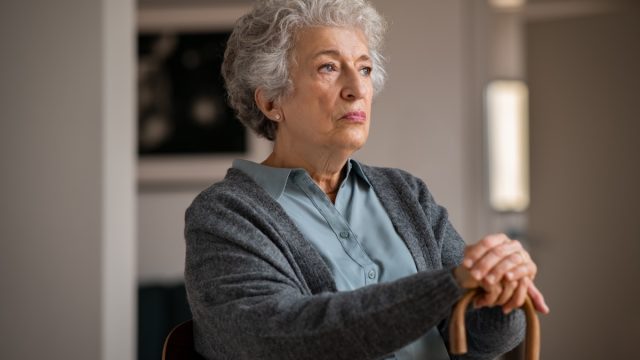 Retired,Unhappy,Woman,At,Home.,Lonely,Serious,Senior,Woman,Holding