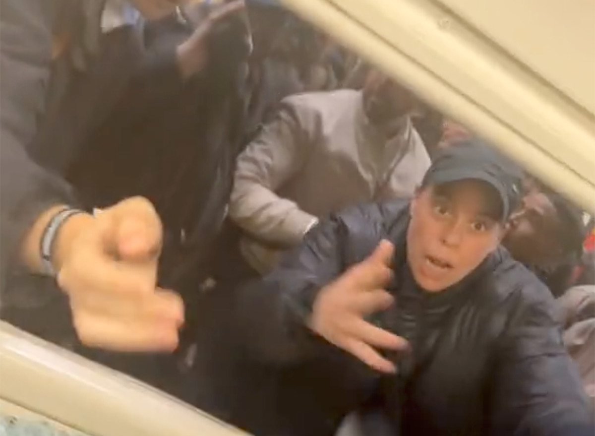 Passengers on Crowded Subway Break Windows