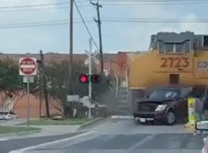 Family Escapes Before Train Plows Into Car