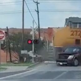 Family Escapes Before Train Plows Into Car