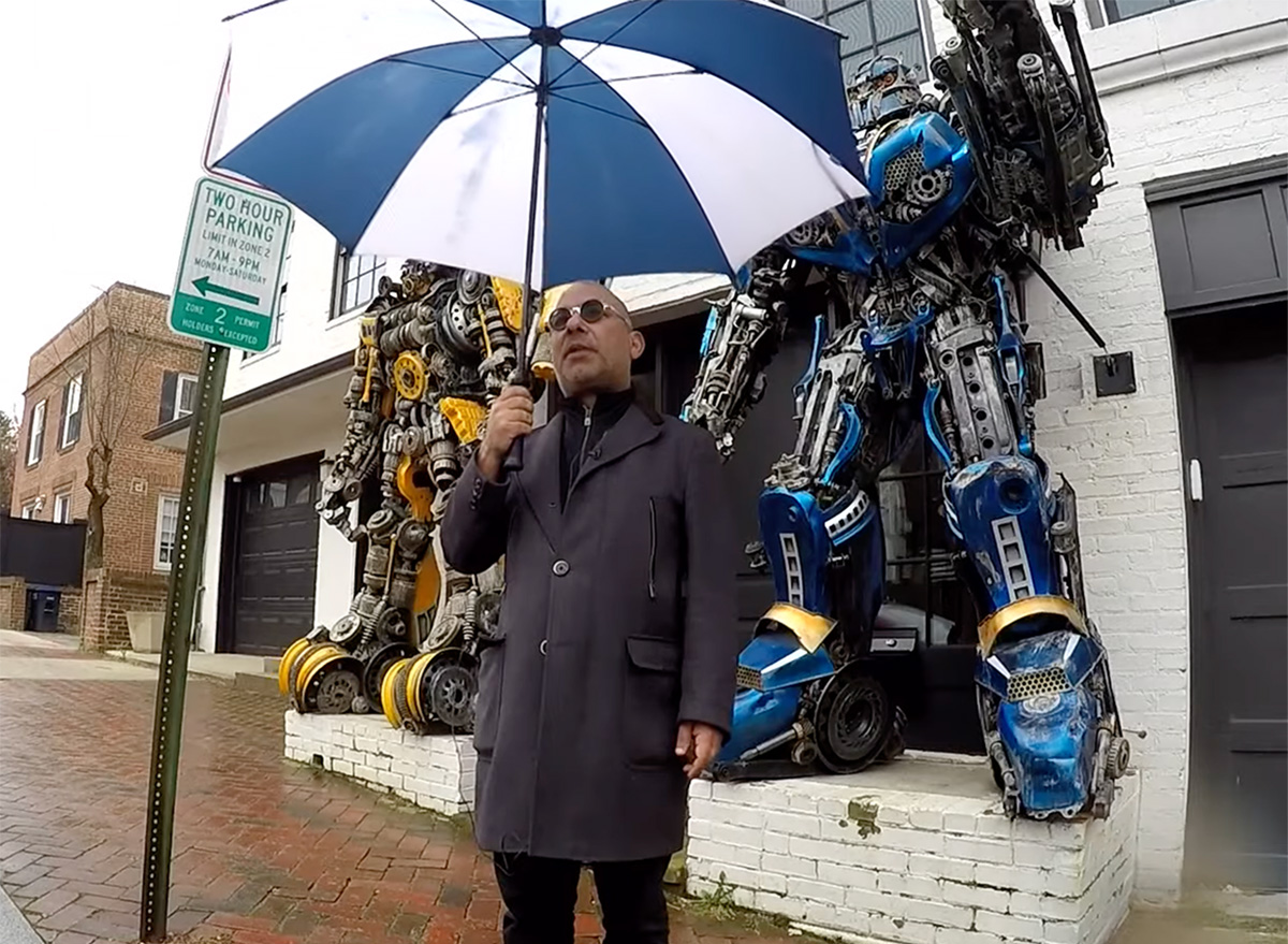 Man Defends Transformers Statues at Home