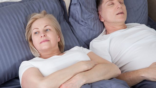 Couple_sleep_bed_awake