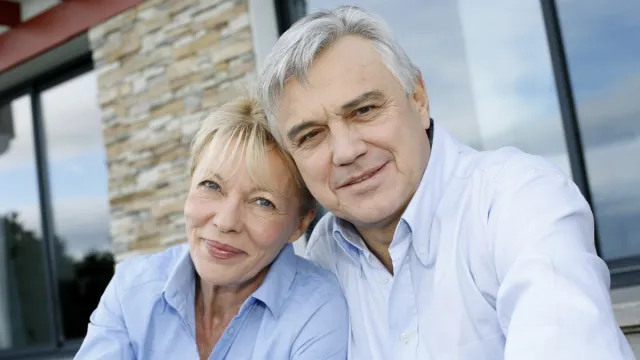 Cheerful,Senior,Couple,Looking,At,Camera