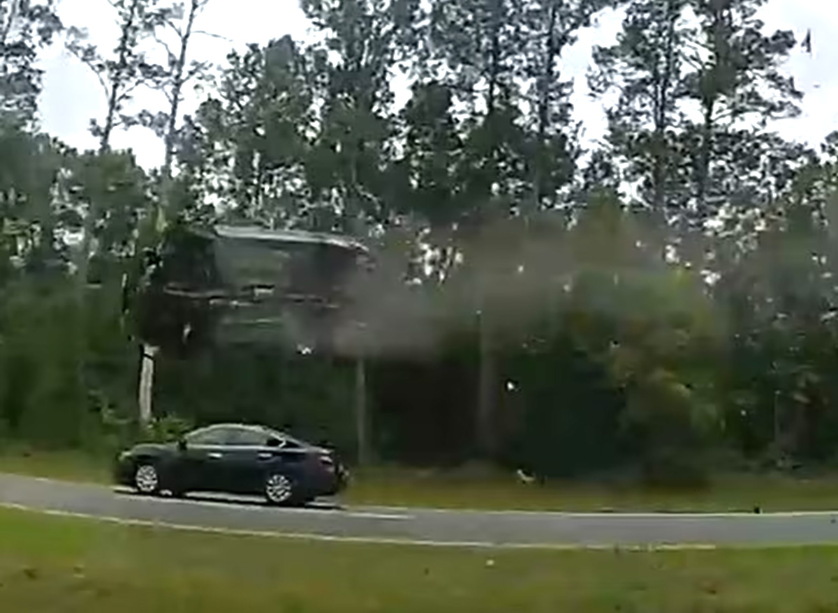 Woman Drives Car Up Tow Truck Ramp, Launches Into The Air