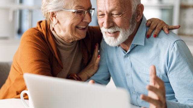 Retire, Retirement, Happy,Mature,Couple,Using,Laptop,At,Home