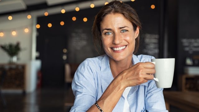 Portrait,Of,Beautiful,Mature,Woman,Drinking,A,Cup,Of,Tea