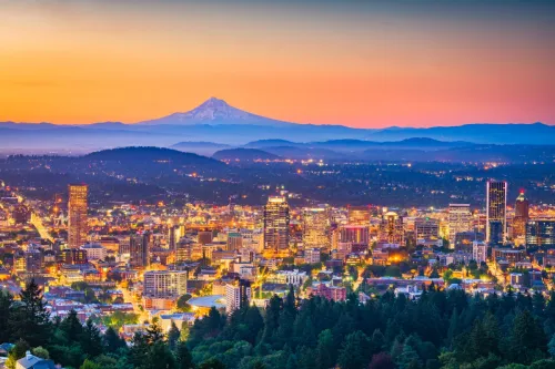 Portland, Oregon, USA skyline at dusk with Mt. Hood in the distance.