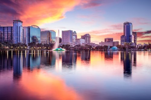 Orlando, Florida, USA downtown city skyline from Eola Park.