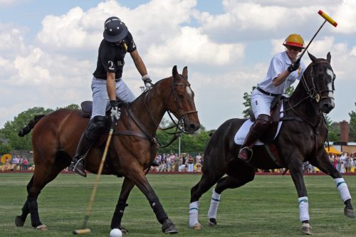 NEW YORK - MAY 30: Argentine polo player Nacho Figueras (L) competes in the Veuve Clicquot Manhattan Polo Classic at Governors Island on May 30, 2009 in New York City.