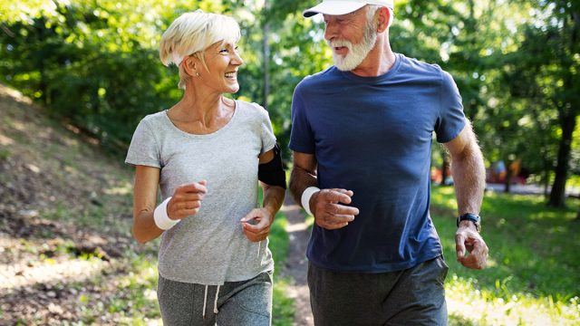 Senior,Mature,Couple,Jogging,And,Running,Outdoors,In,City