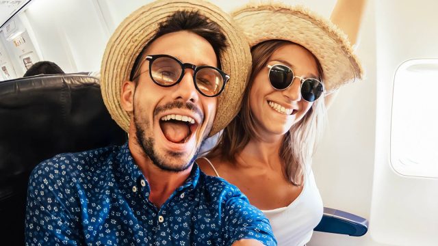 Happy,Tourist,Taking,Selfie,Inside,Airplane, ,Cheerful,Couple,On