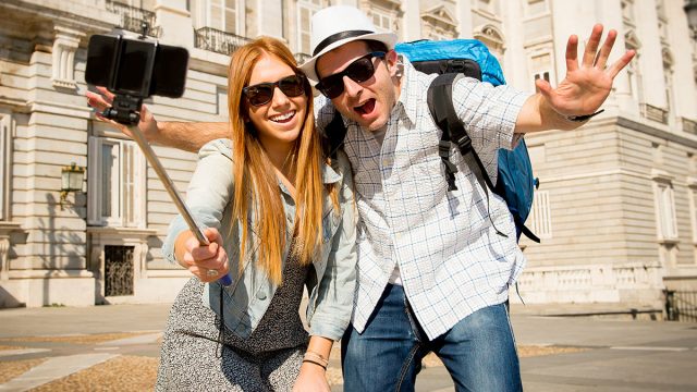 Young,Beautiful,Friends,Tourist,Couple,Visiting,Spain,In,Holidays,Exchange