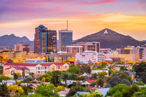 Tucson, Arizona, USA downtown skyline with Sentinel Peak at dusk.