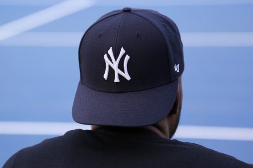 Fan wears New York Yankees hat