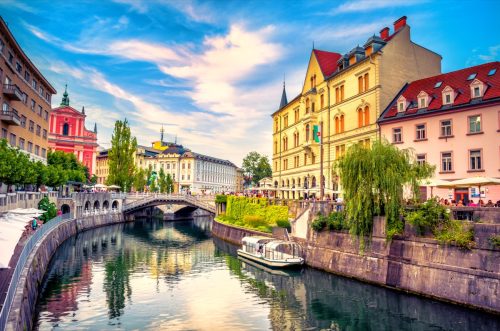 Cityscape view on Ljubljanica river canal in Ljubljana old town.