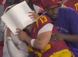 Heisman Winner Cries in Mom’s Arms After Loss