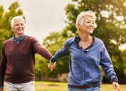 Love keeps a marriage alive. Shot of a happy senior couple going for a walk in the park.