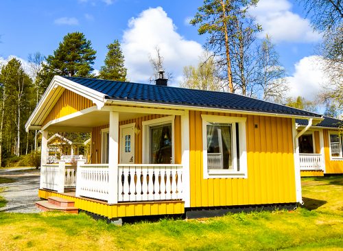 Finnish yellow house in wood camp