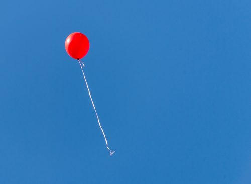 red balls in the blue sky