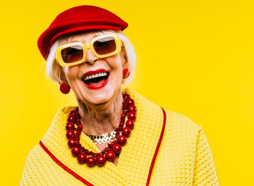 Happy and funny cool old lady with fashionable clothes portrait on colored background - Youthful grandmother with extravagant style, concepts about lifestyle, seniority and elderly people