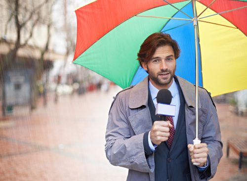 And it looks like rain today folks. A smiling weatherman reporting from an urban area.